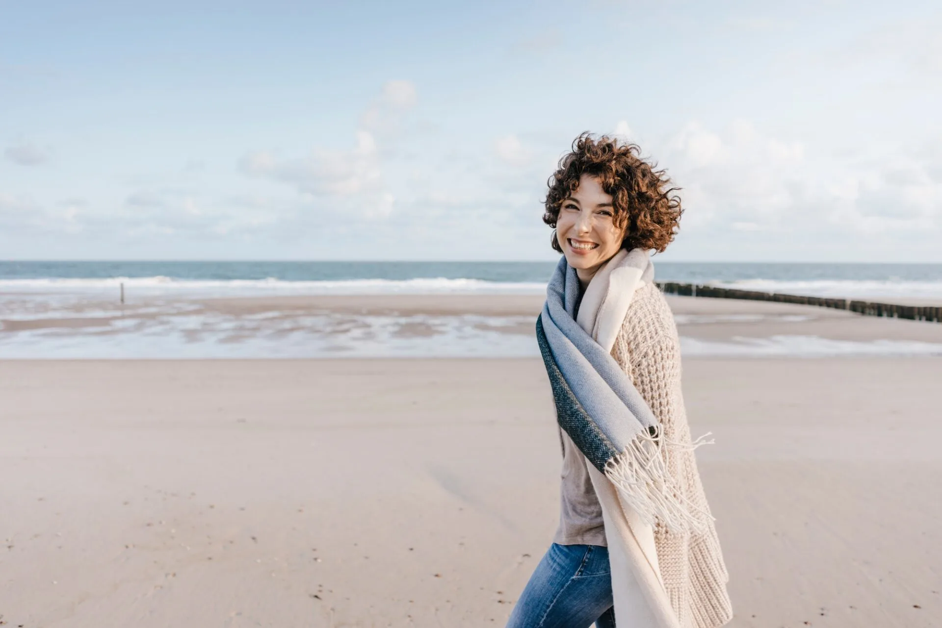 Portrait of happy woman on the beach